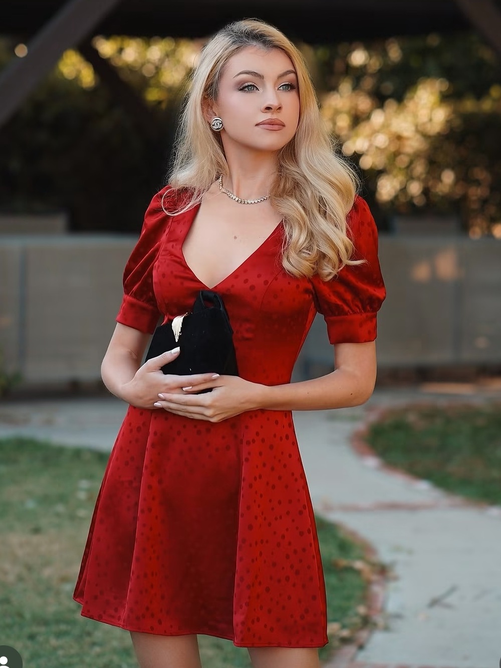 Charles Henry Red V-Neck Puff Sleeve Mini Dress. With front black bow detail.